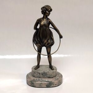 Art Deco Style Girl With Hoop Bronze Figurine on marble base in the style of Fer